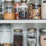 Eco Labels - Clear Glass Jars on White Wooden Shelf