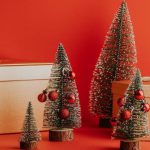 Hostess Gifts - Small christmas trees and boxes on a red background