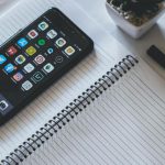 Educational Apps - Space Grey Apple Iphone on Notebook Page