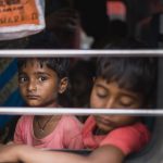 Sleep Aids - Two children look out of a train window