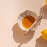 Organic Products - Honey and Lemons on White Studio Background