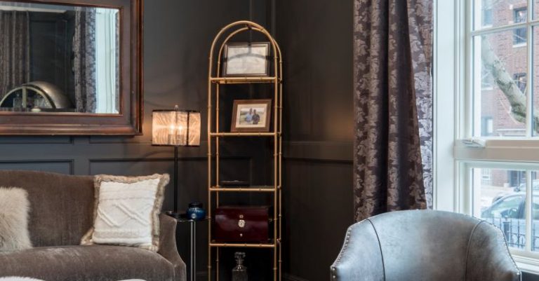 Area Rug - Vacant Gray Leather Tub Chair in Room