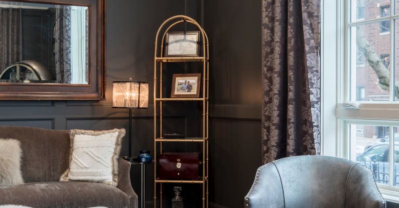 Area Rug - Vacant Gray Leather Tub Chair in Room